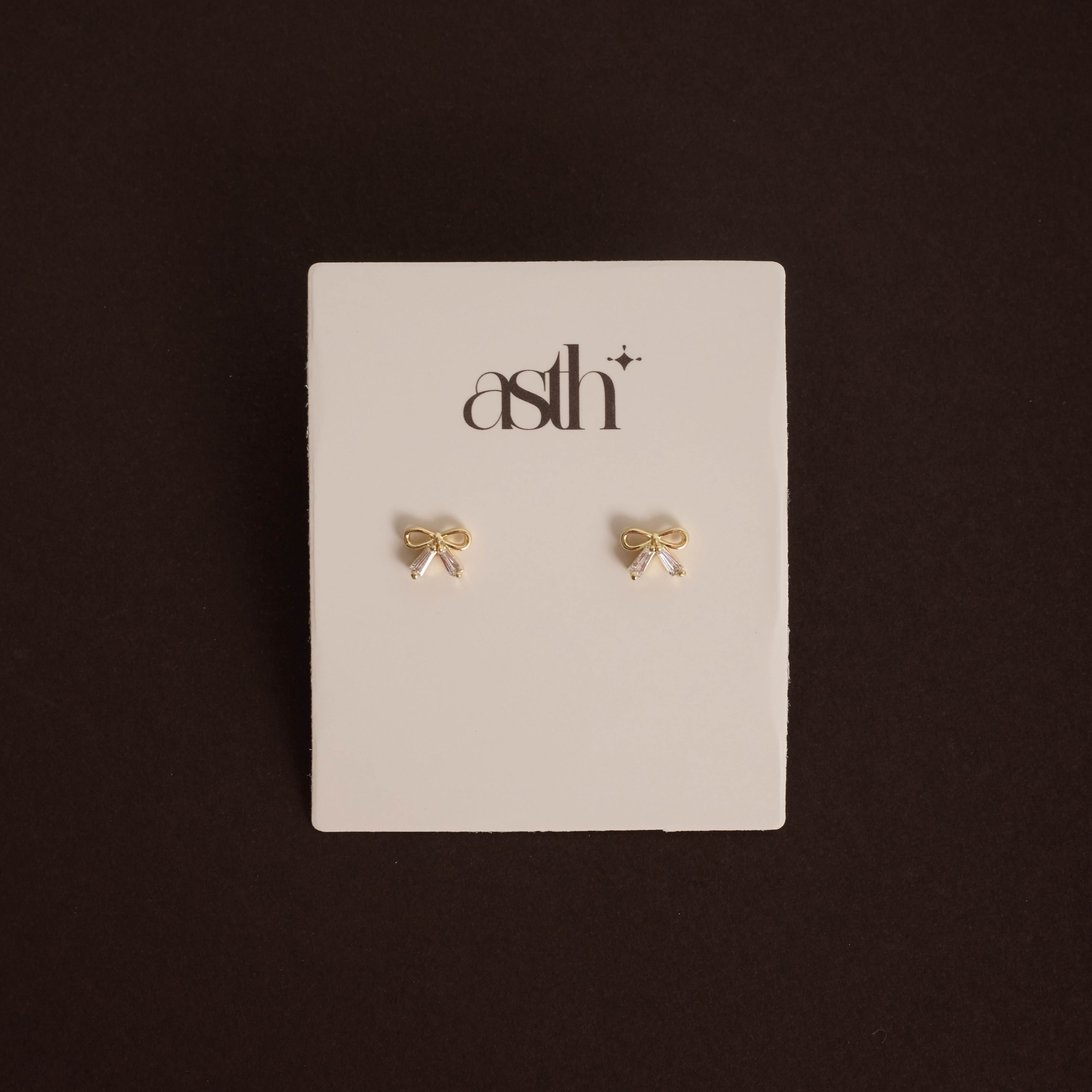 Brinco laço com zircônias 7mm