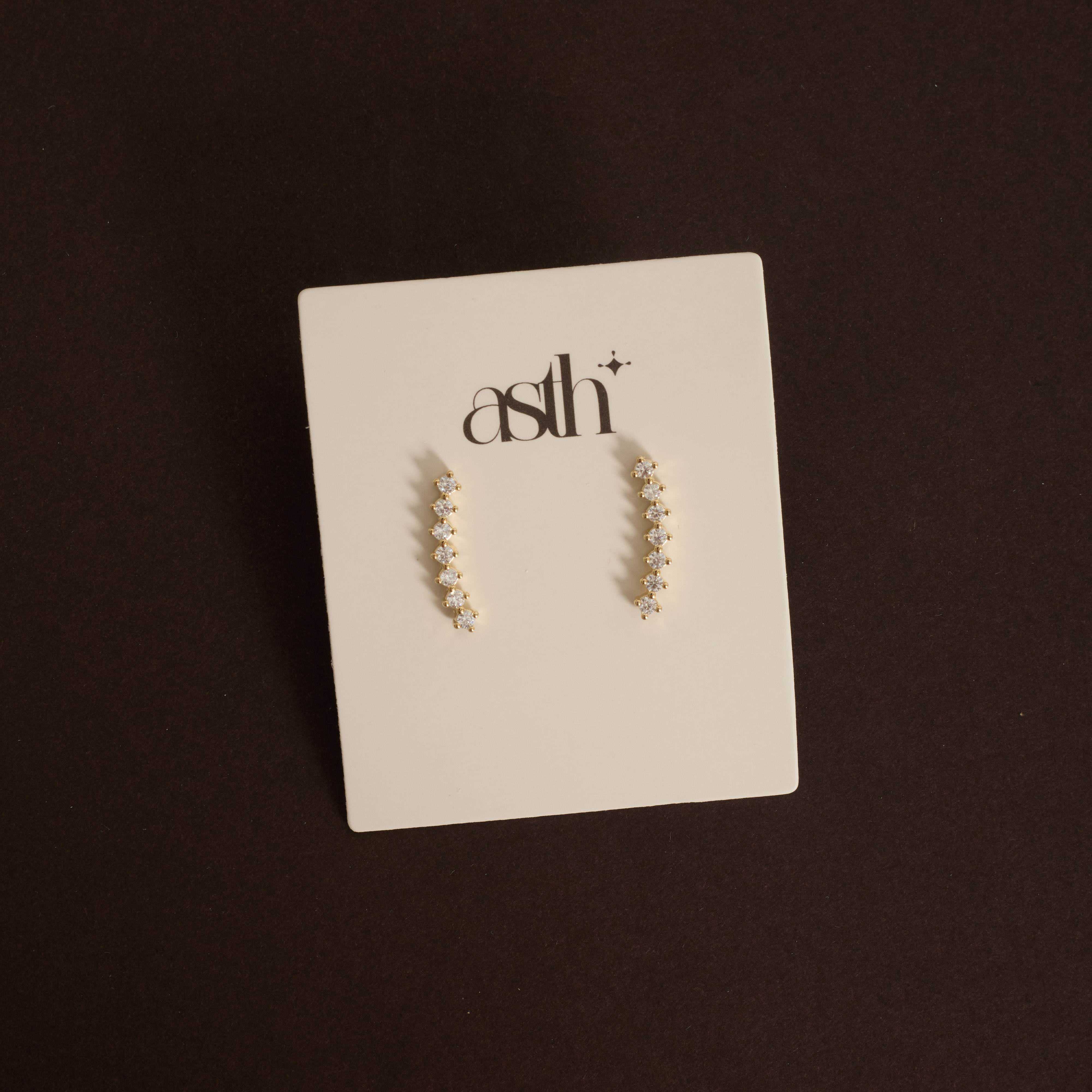 Brinco curva cravejada 18mm