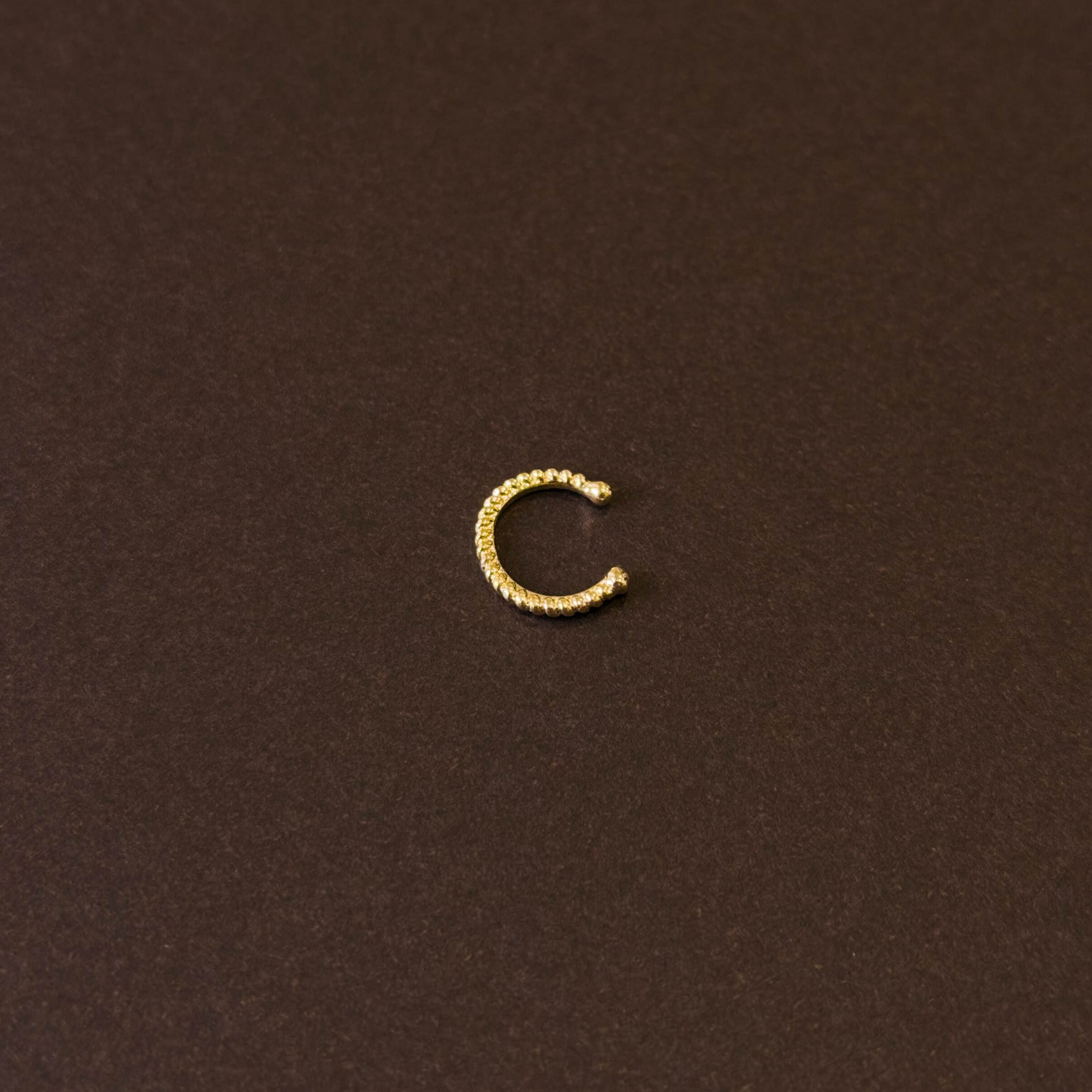 Piercing fake argola fio torcido